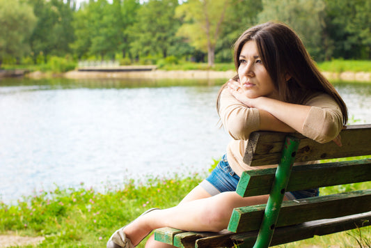 woman feeling sad during summer